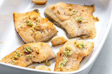 Canvas Print - salmon trout baked with garlic