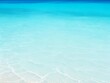© Kisandaya - Light blue sea waves with transparent ocean water and light reflections on sandy beach. abstract Water Ripple texture, Sea surface background. ai generated