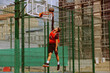 © Artur Didyk - A basketball player plays streetball on a hot day.