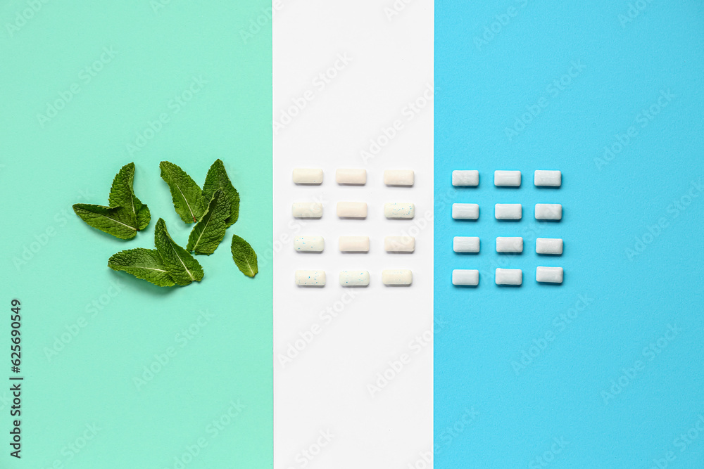 Fresh chewing gums with mint on colorful background