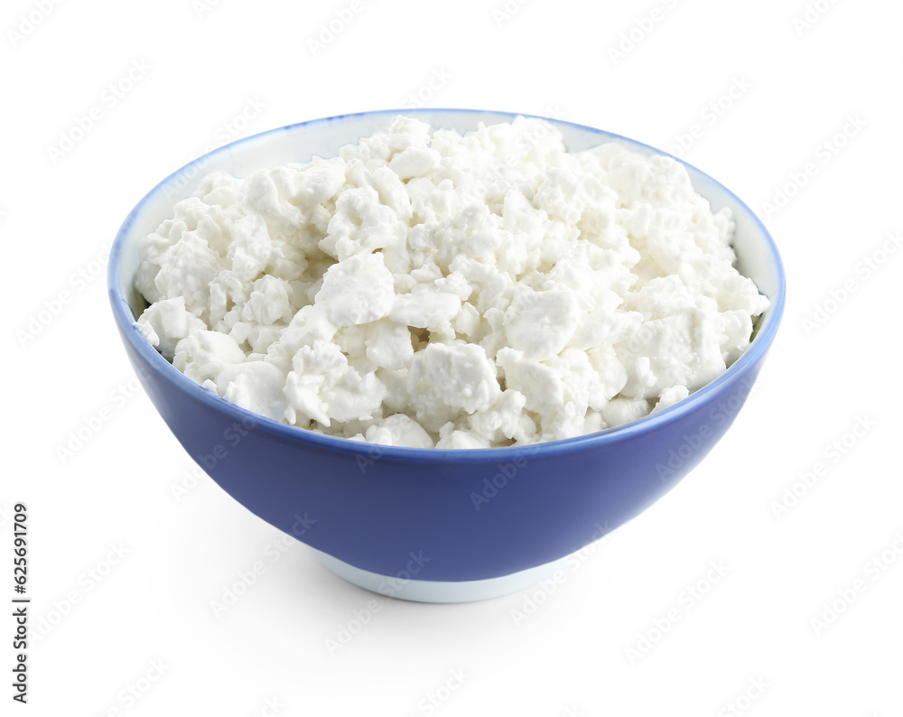 Bowl of tasty cottage cheese on white background