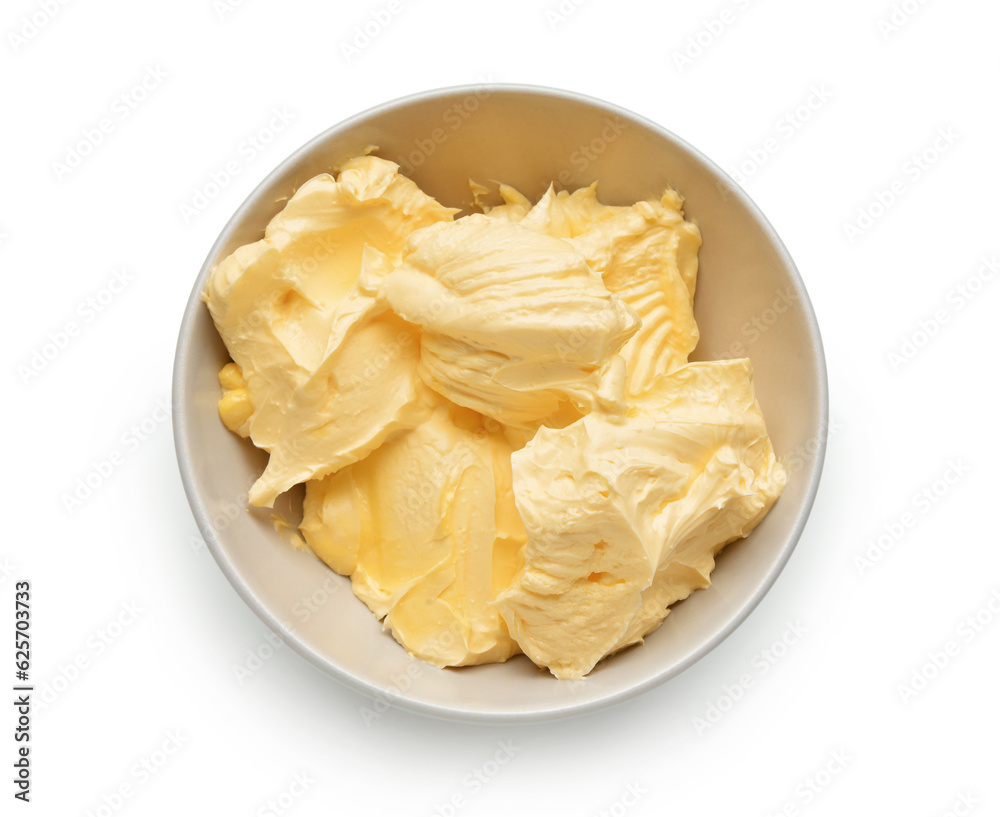 Bowl with fresh butter on white background