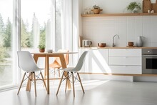 Scandinavian Minimalist Kitchen Following Restoration In New Home. Dishes, A Table, And Chairs Are All White And Are In A Room With A Light Wall. Promotional Offer And Design-related Blogs About