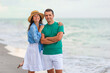 © travnikovstudio - Young couple on white beach during summer vacation.