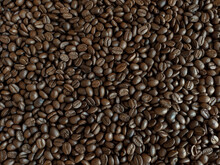 Roasted Coffee Beans Stacked Abstract Background  Aromatic Bitter Coffee That Is Popular To Eat In The Morning To Feel Refreshed. Cure Drowsiness.