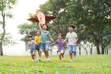 group image of cute asian children playing in the park