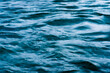 © Andrew Kornylak - macro blue wave pattern in a river with motion blur