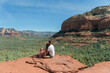 © travnikovstudio - Travel in Devil's Bridge Trail, scenic view panoramic landscape in Sedona, Arizona, USA. Happy Couple on the famous trail in Sedona