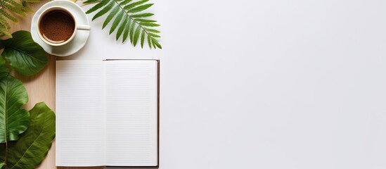Poster - Photo of a coffee cup and notebook on a desk with plenty of space for creativity with copy space