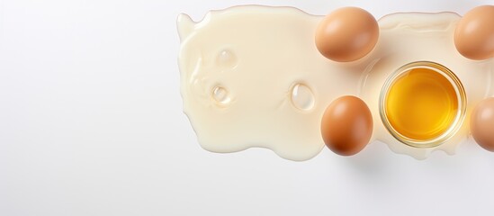 Aufkleber - Photo of eggs and a cup of milk on a white background with copy space