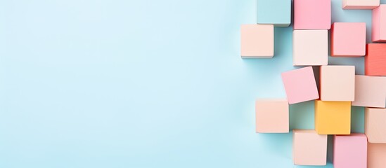 Poster - photo of a colorful abstract background with vibrant squares on a blue backdrop with copy space