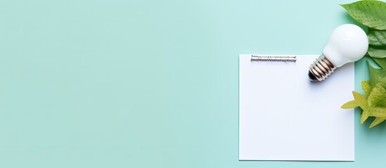 Aufkleber - Photo of a notepad with a light bulb on top, perfect for jotting down ideas and inspiration with copy space