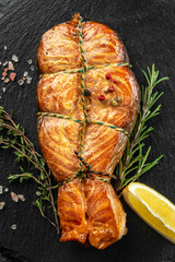 Wall Mural - Grilled salmon steak on a dark background, Concept healthy and balanced eating. place for text, top view