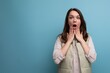 © Ivan Traimak - emotional young brunette woman shows surprise with facial expressions and hands