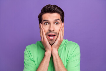 Sticker - Photo of funny young guy touch cheekbones surprised impressed reaction wear trendy t-shirt unexpected news isolated on purple background