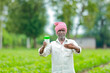 © SDV Ads - Indian happy farmer holding empty Bottle in hands, happy farmer showing white Bottle