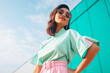 © Keitma - Gen-z beautiful asian fashionable female, wearing neon stylish clothes, happy, smiling, retro style in the style of Vaporwave fashion