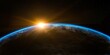 Erde mit im Universum - Sonnenaufgang hinter Planet im Weltall