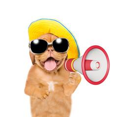 Aufkleber - Happy puppy with mirrored sunglasses and summer hat screaming into a megaphone. isolated on white background