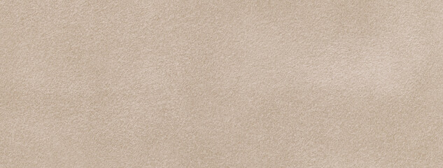 Texture of velvet matte beige background, macro. Suede light brown fabric with pattern. Seamless textile felt backdrop,