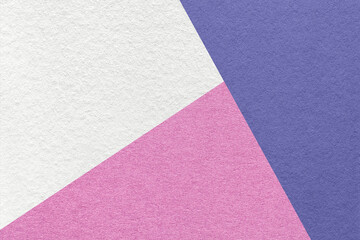 Texture of craft white, lilac and violet shade color paper background, macro. Vintage abstract pink cardboard