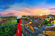© tawatchai1990 - Tourist enjoying sunset on rooftop at Hoi an ancient town, Vietnam.