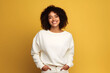 © AnaWein - Young woman wearing white sweatshirt mockup, at yellow background. Design pullover template, print presentation mock-up. Generated AI.
