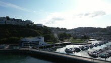 Torquay, Torbay, South Devon, England: DRONE VIEWS: The Drone Reverses Away From Torquay Marina Showing The English Riviera Wheel, The Princess Theatre And Boats And Yachts In The Marina. 