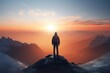 © LaxmiOwl - Abstract Male Hiker stands at the summit of a difficult mountain climb to be greeted with a beautiful view of the sunrise. Generative ai.