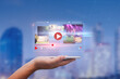 © panuwat - live video content online streaming marketing concept.close-up of Hands holding mobile phone