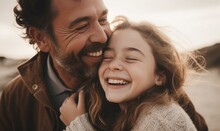 Happy Family Daughter Hugging Dad And Laughs On Holiday