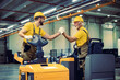 © ivanko80 - Workers driving electric forklift at workplace