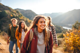 Fototapeta Las - A group of teenagers hiking and enjoying nature, a group of young friends exploring the great outdoors, embracing an active lifestyle in nature