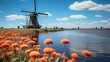 A typical Dutch countryside with iconic windmills, tulip fields in full bloom, and clear canals reflecting the blue sky.