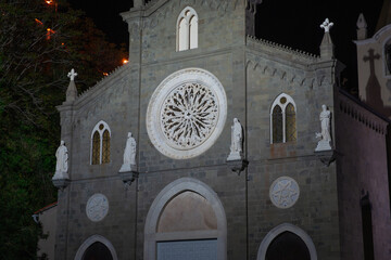 Poster - Night scene front facade of Church of San Giovanni Battista in Riomaggiore