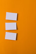 White business cards and copy space on orange background