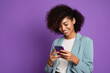 © AI_images - woman with phone on purple background . AI Generated