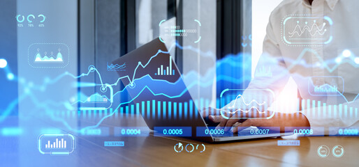 Poster - Man with laptop in office and stock market charts