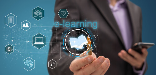 Leinwandbilder - Business, Technology, Internet and network concept. Young businessman working on a virtual screen of the future and sees the inscription: E-learning