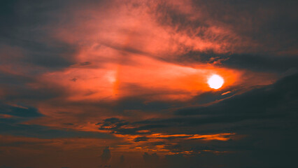 Wall Mural - abstract photo of dramatic clouds on the sunset or evening time.