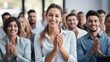 © visoot - Team and employees clapping hands for success, Support, Achievement and diverse group of people applauding together in business meeting