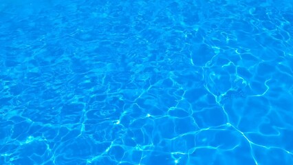 Sticker - Blue water in the pool with sun glare.