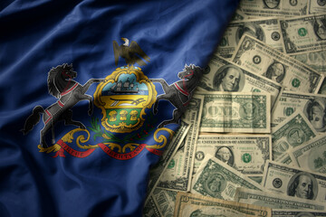 Wall Mural - colorful waving national flag of pennsylvania state on a american dollar money background. finance concept