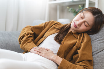 Wall Mural - woman have stomach pain from menstruation.