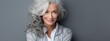 Portrait of a beautiful elderly senior model woman with grey hair