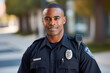 A portrait of proud and confident African American male police officer in uniform