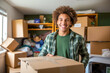 © MVProductions - A male college freshman unpacking his things and stuff, moving into his university dorm room