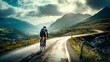 Leinwandbild Motiv man riding a road bike on a mountain road on a cloudy day