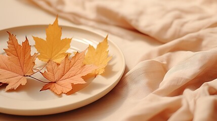  a plate with two maple leaves on it next to a blanket.  generative ai