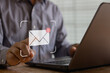 © THAWEERAT - New email notification concept for business e-mail communication and digital marketing. Inbox receiving electronic message alert. business person touch on email in virtual screen. internet technology.